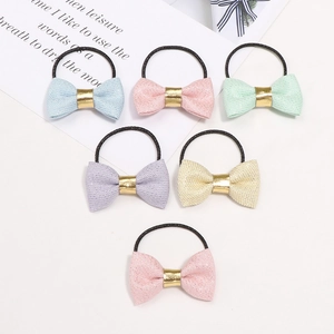 Set of 6 glitter bow hair ties for toddlers in pastel colors with elastic bands