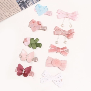Set de pinzas para el cabello con lazos rosas, corazones y perlas para niñas