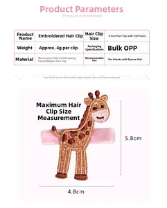 Détail d'une pince à cheveux girafe de 5,8 cm en broderie non tissée avec ruban velours