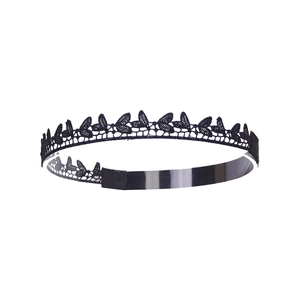Detail of black lace hairband featuring intricate embroidery and adjustable strap