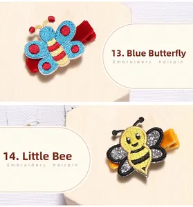 Détails de barrettes brodées papillon bleu et petite abeille avec base en velours
