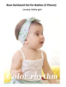 Three-pack floral baby headbands with decorative bow on an infant model in soft lighting