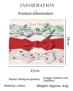 Three-piece baby headband set with green floral, red, and cherry patterns on display card
