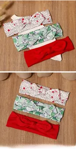 Three-piece baby headband set featuring cherry print, leaf pattern and solid red bows