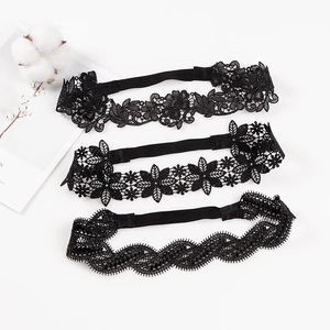 Three-piece set of black hollow lace headbands with diverse floral embroidery designs