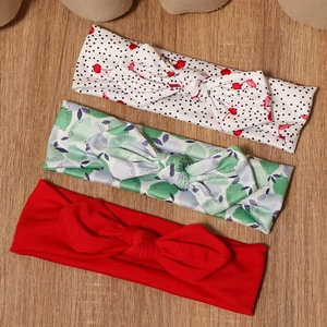 Baby bow headband set with cherry polka dot, mint leaf, and solid red elastic bands