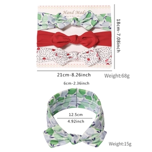 Three-piece baby bow headband set in green floral, solid red, and black polka dot designs