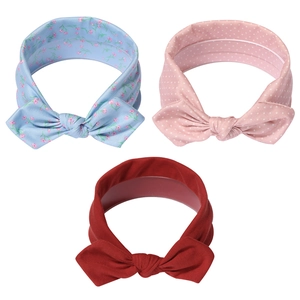 Three-piece baby girls bow headband set with floral, polka dot, and solid burgundy styles