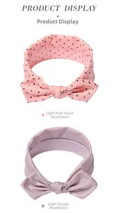 Detailansicht von Baby-Stirnbändern mit rosa Herzprint und lila Polka-Dot-Muster