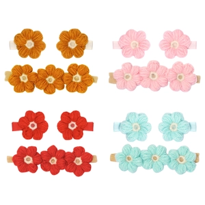 Vista detallada de 10 piezas de pinzas y diademas de nailon con flores de punto a mano