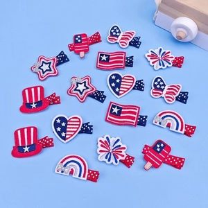 Detailed view of 16 American Independence Day themed hair clips with patriotic patterns