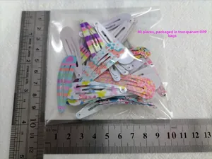 Set of 40 pieces colorful printed metal snap hair clips in transparent OPP bag packaging