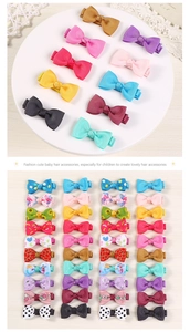 Detailed assortment of colorful grosgrain ribbon bow hair clips for girls in various patterns