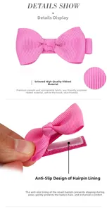 Detail showing pink grosgrain ribbon bow hair clip with non-slip lining for babies