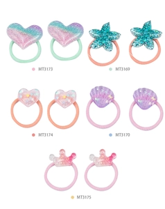 Detailed view of colorful heart and star resin hair ties with glitter and elastic bands
