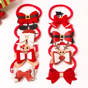 8-piece set of Christmas nylon baby headbands featuring Santa, reindeer and snowman