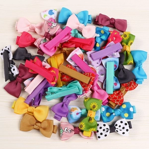 Assorted colorful grosgrain ribbon hair bows for girls with cute floral and polka dot patterns