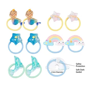 Set of 10 glittery resin heart and star hair ties with soft protective fabric pads