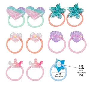 Set of 10 glittery heart and star hair ties for toddlers with soft safety padding