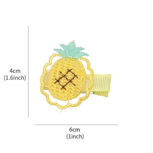 Handmade embroidered yellow pineapple hair clip with 6cm and 4cm dimensions shown