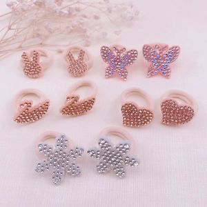 Detailed set of 10 rhinestone animal hair ties featuring rabbit and butterfly designs