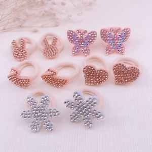 Detail of 10pcs rhinestone animal hair ties featuring butterflies and rabbits for kids