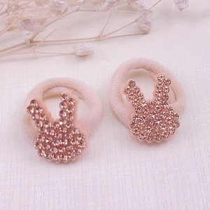 Elastic pink hair ties for kids featuring crystal rhinestone animal rabbit ornaments
