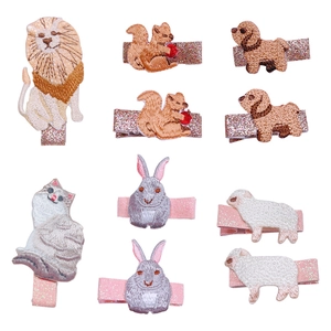 Embroidered animal hair clips for kids featuring lion squirrel and bunny in glitter fabric