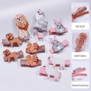 Embroidered animal hair clips for kids with glitter fabric and non-slip duckbill grip