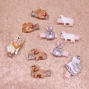Set of 10 embroidered animal hair clips for kids featuring squirrels, lions and rabbits
