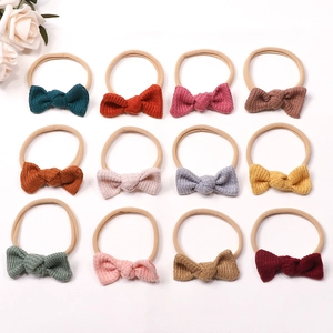 12-piece baby waffle bow headbands set with stretchy nylon bands in various Morandi colors