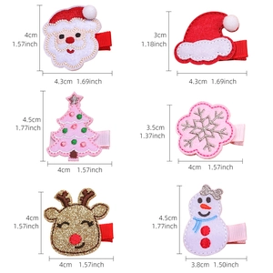 Christmas hair clips set featuring Santa, reindeer, and snowman designs for festive girls