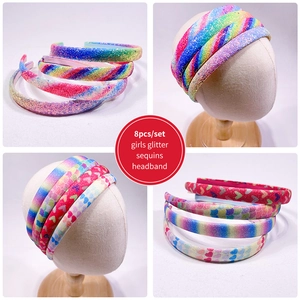 Set of 8 glitter rainbow headbands for girls featuring colorful heart patterns and sequins