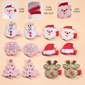 Kids Christmas embroidery hair clips featuring Santa and reindeer with non-slip clips