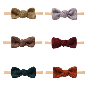 Set of 6 waffle knit baby headbands with handmade bows in earthy autumn colors