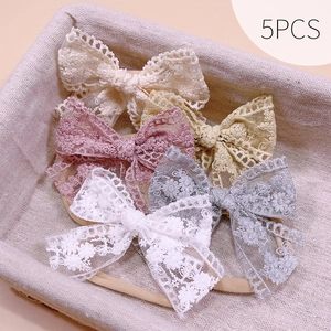 Detailed embroidery on floral lace baby headbands with elastic seamless nylon bands