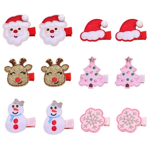 12-piece Christmas hair clips set with Santa, reindeer, and snowmen for festive girls