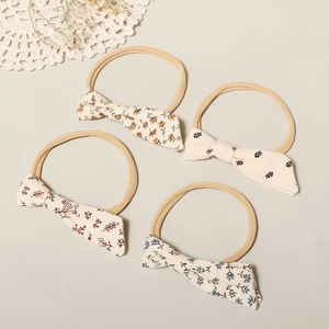 Set of four floral cotton bow headbands with soft elastic nylon straps for baby girls