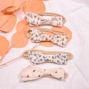 Set of four floral cotton bow headbands for baby girls with soft nylon elastic bands