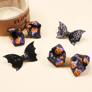 Halloween hair clip set featuring glitter bat wings and pumpkin bows with wizard hats