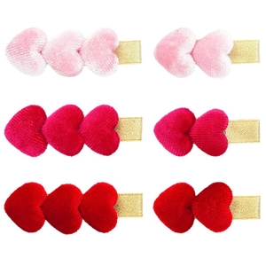 Set mit sechs herzförmigen Samthaarklammern für Mädchen in Pink und Rot auf Gold