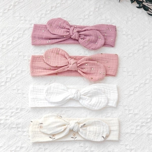 Set of 4 soft muslin cotton baby headbands with cute rabbit ears and floral patterns