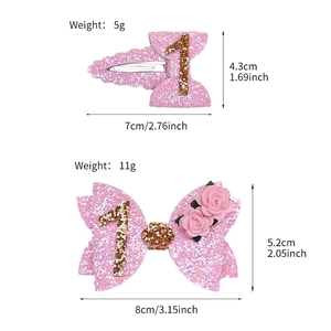 Pink glitter hair clip and bow set with gold number 1 for girls 1st birthday