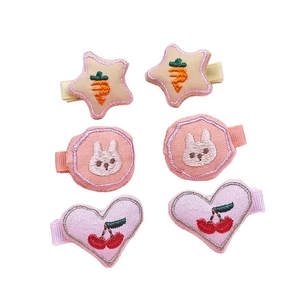 Set of 6 embroidered fabric hair clips for kids featuring stars, rabbits, and cherry designs