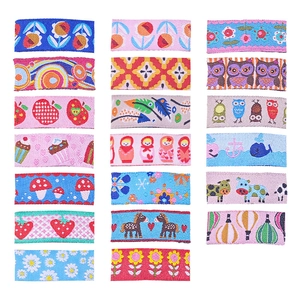 Assortment of 20 embroidered fabric clips with cartoon animals, flowers, and fruits for girls