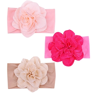Set of three soft nylon baby headbands with large fabric flowers for infants aged 0-3 years