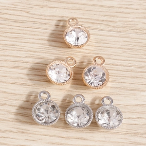 Luxurious round crystal pendants in gold and silver metal frames for DIY jewelry