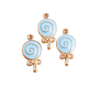 Three-piece set of light blue enamel lollipop charms with gold alloy frames and bow details