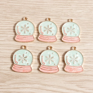 Set of six Christmas snowball alloy pendants with mint green and pink enamel and gold accents