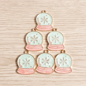 Pastel snowflake crystal ball charms in light green and pink with gold loops for DIY